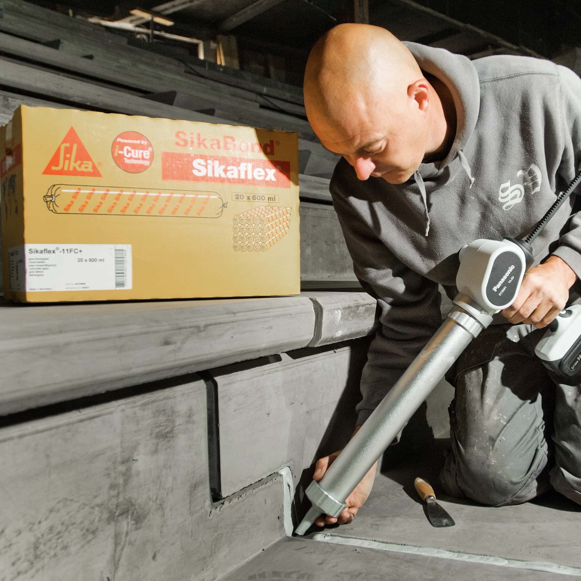 sikaflex sikafloor grey concrete steps expansion joint compressor gun